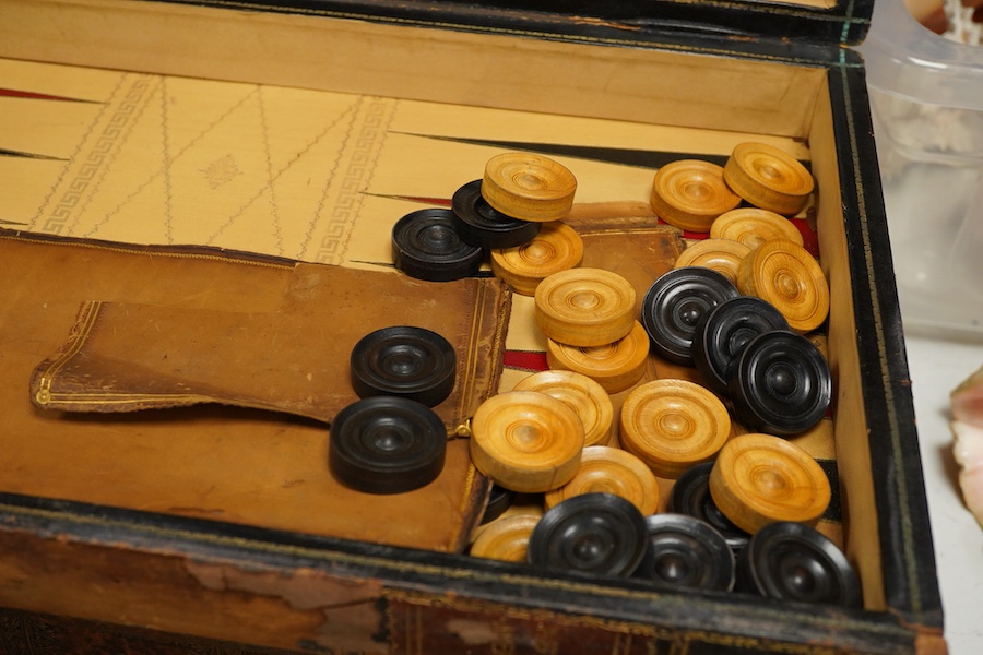 Three late 19th/early 20th century folding chess/backgammon boards fashioned as books